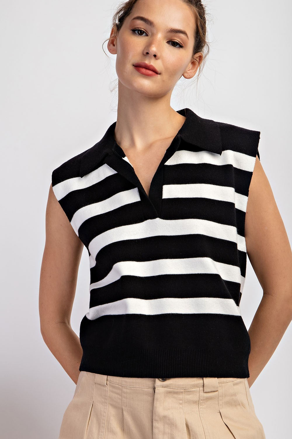 Black and white horizontal striped sleeveless knit top, front view