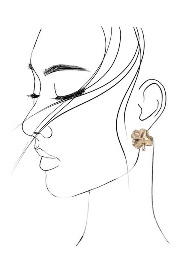 Line art of a woman's face with a gold earring on a white background