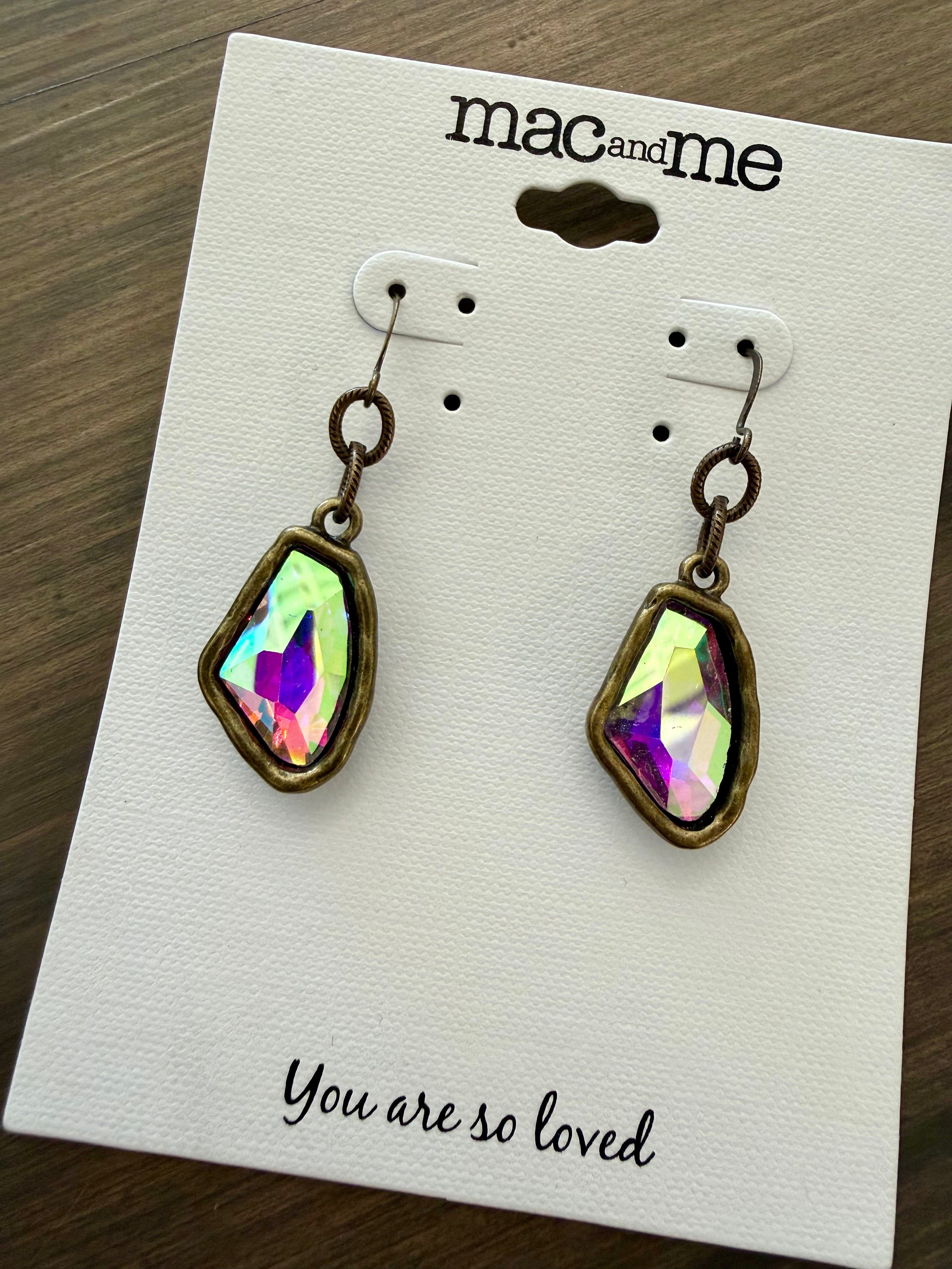 Earrings with colorful gemstones on a 'mac and me' branded card.