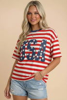 Woman wearing a red, white, and blue striped shirt with 'USA' design on a beige background