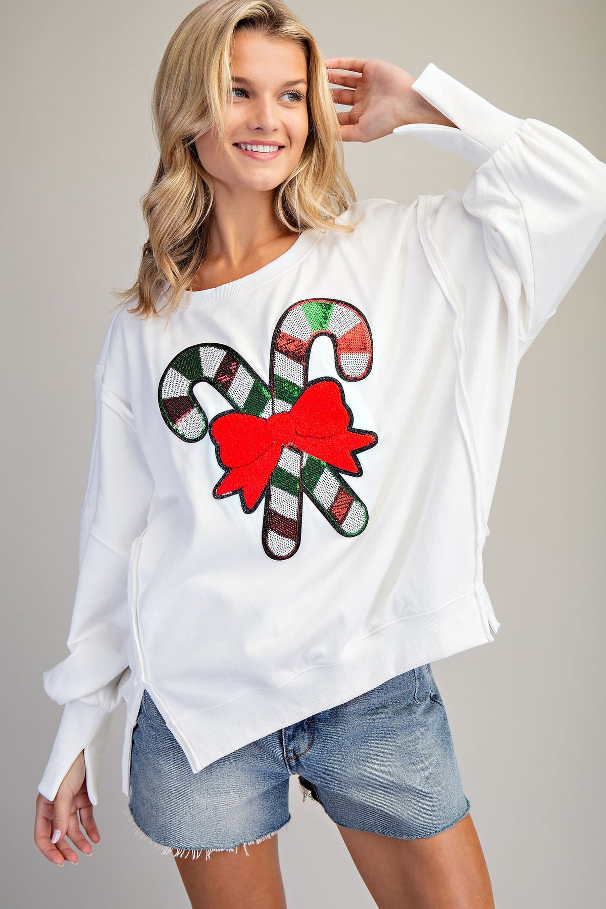 Off White holiday sweatshirt, full-length front view