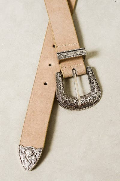 Beige leather belt with silver embossed buckle on a light beige background