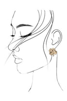 Line art of a woman's face with a gold earring on a white background