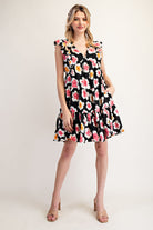 Woman wearing a floral dress on a white background