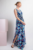Woman wearing a floral dress with a white background
