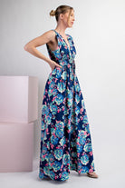 Woman wearing a floral dress on a white background