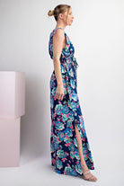 Woman wearing a floral dress with a white background