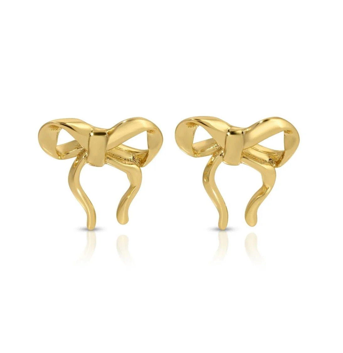 Gold bow-shaped earrings on a white background