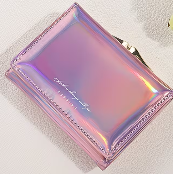 Iridescent pink wallet with brand name on a light background