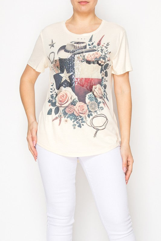 Person wearing a cream-colored t-shirt with a graphic design on a white background
